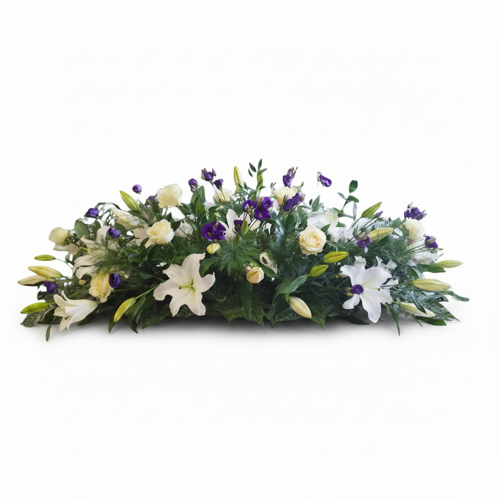 Floral arrangement with white Lillies and purple flowers on a white background. Casket Spray for funeral flowers