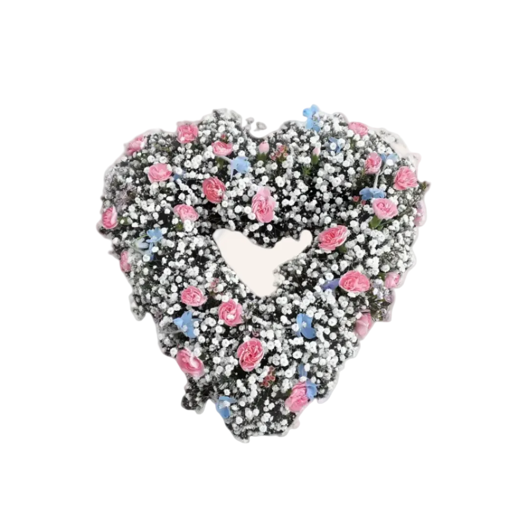 A floral arrangement in the form of a heart, made with white gypsophila and blue and pink spray carnations.